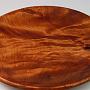 This shallow bowl/platter is a piece of curly Redwood, about 12 1/2" diameter by 1 1/2" tall.
